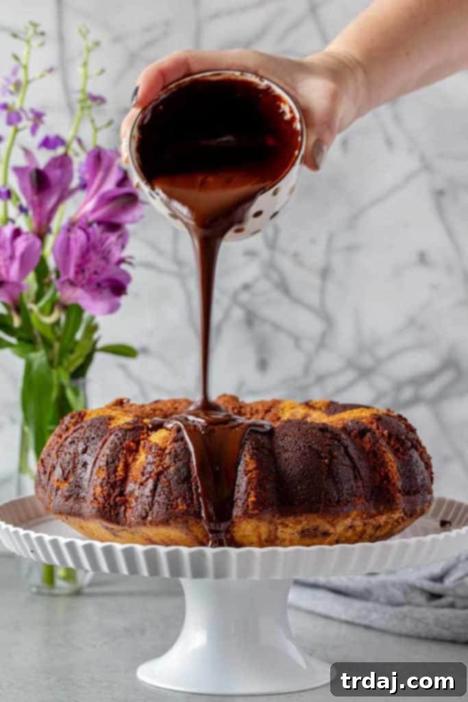 Tiramisu Swirl Delight 8 Tiramisu Marble Cake with espresso ganache drizzled on top