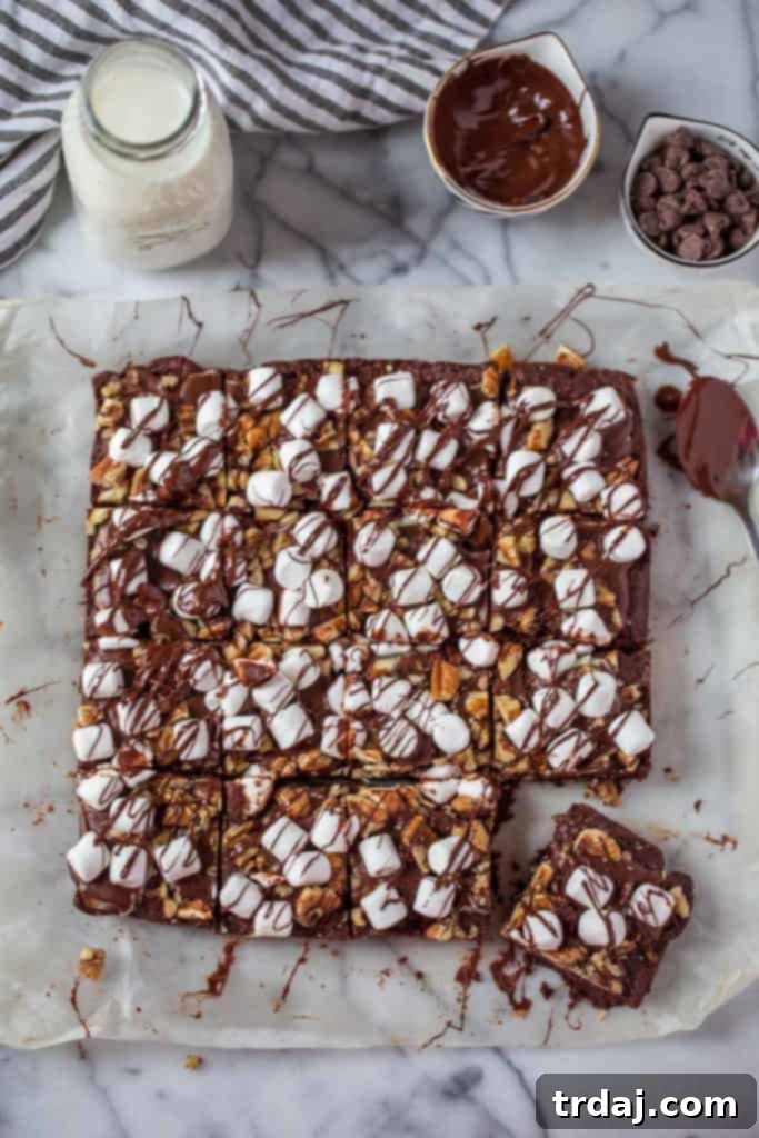Mocha Mint Mississippi Mud Brownies cut into 16 perfect squares, showcasing their fudgy texture and delicious toppings.