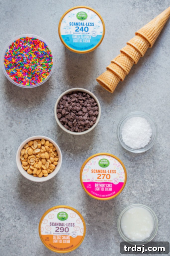 Essential ingredients for healthier homemade ice cream drumsticks: light ice cream, sugar-free chocolate, cones, and toppings Ingredient list shot for homemade ice cream drumsticks styled on a concrete surface