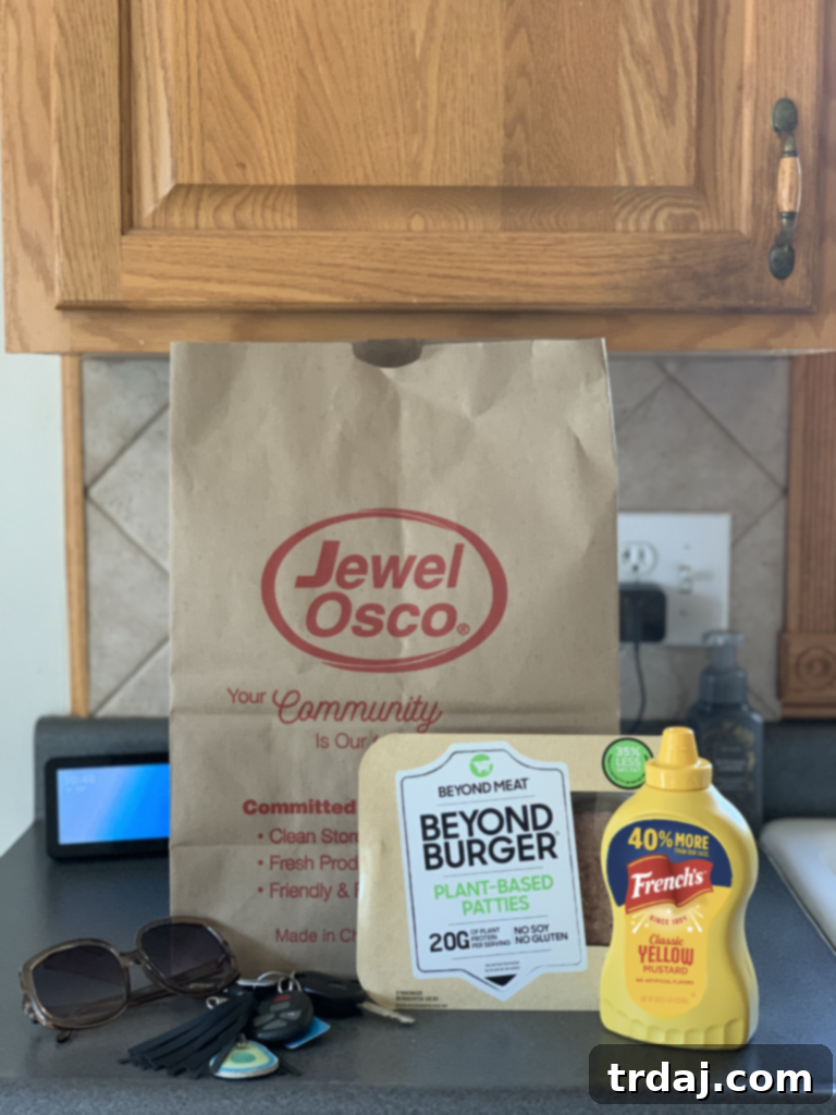 Signature Chicago Beyond Burger 4 A vibrant kitchen lifestyle shot showcasing a Jewel-Osco shopping bag, with packages of Beyond Meat plant-based patties and a bottle of French's Yellow Mustard prominently displayed, ready for cooking.