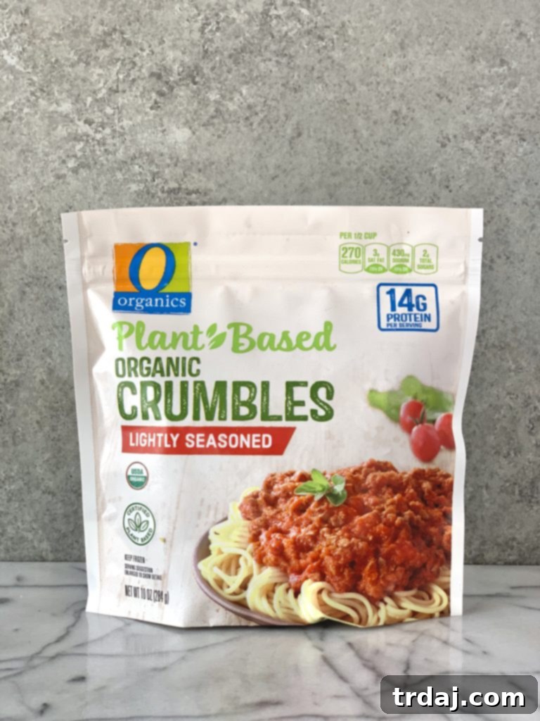 O Organics Plant Based Organic crumbles lightly seasoned and warmed in a skillet, ready for the next ingredients