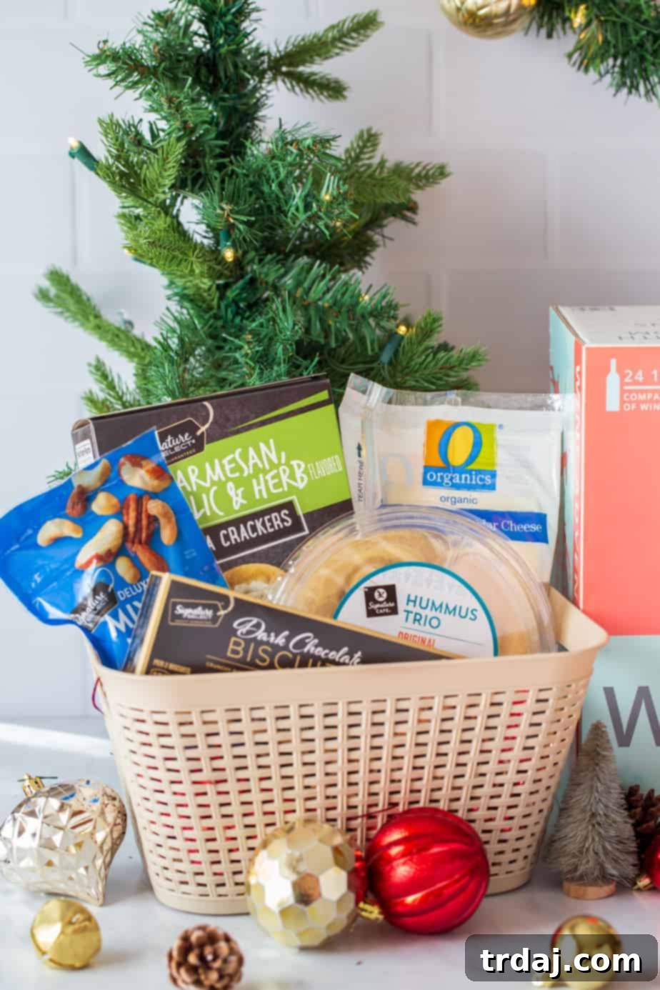 A festive spread with a partially opened wine advent calendar and holiday decorations