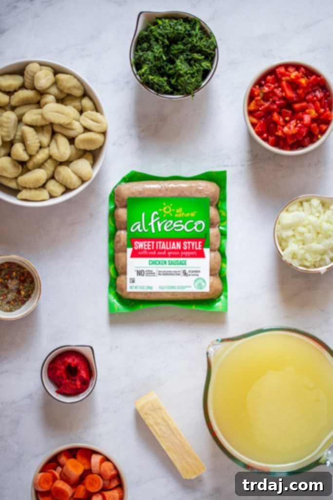 Various fresh ingredients for Italian Chicken Gnocchi Soup laid out on a cutting board