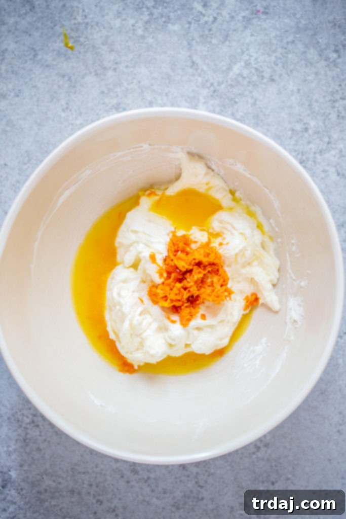 1. Beat cream cheese and sugar in a small bowl with a hand mixer until combined, about 2 minutes. Add orange peel and orange juice and beat again until smooth