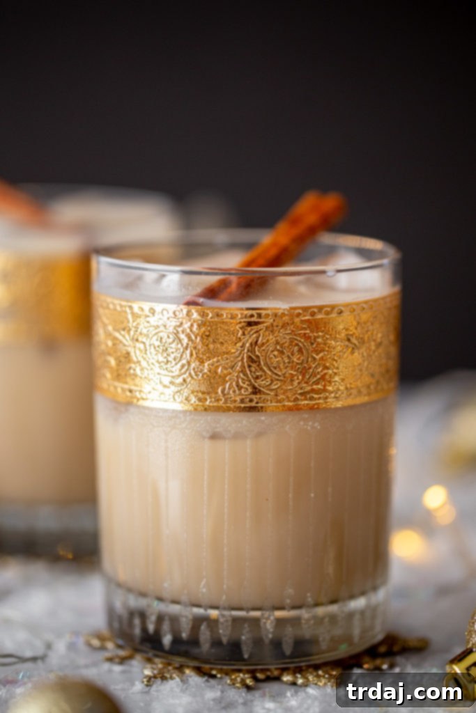 Close up shot of Oatmeal Cookie White Russian cocktail recipe in vintage gold leaf rocks glasses