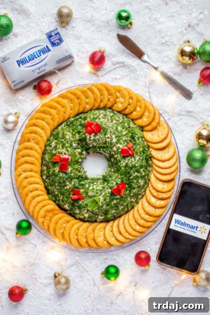 An overhead shot of the festive Bacon Cheddar Cheese Ball Wreath, highlighting its beautiful presentation and ingredients, emphasizing its availability with Philadelphia cream cheese at Walmart.