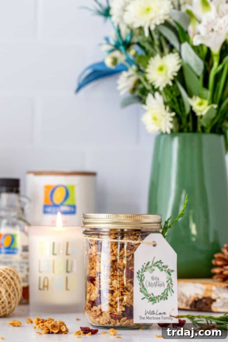 Homemade Baked Granola in a Jar with festive Merry Christmas gift tags