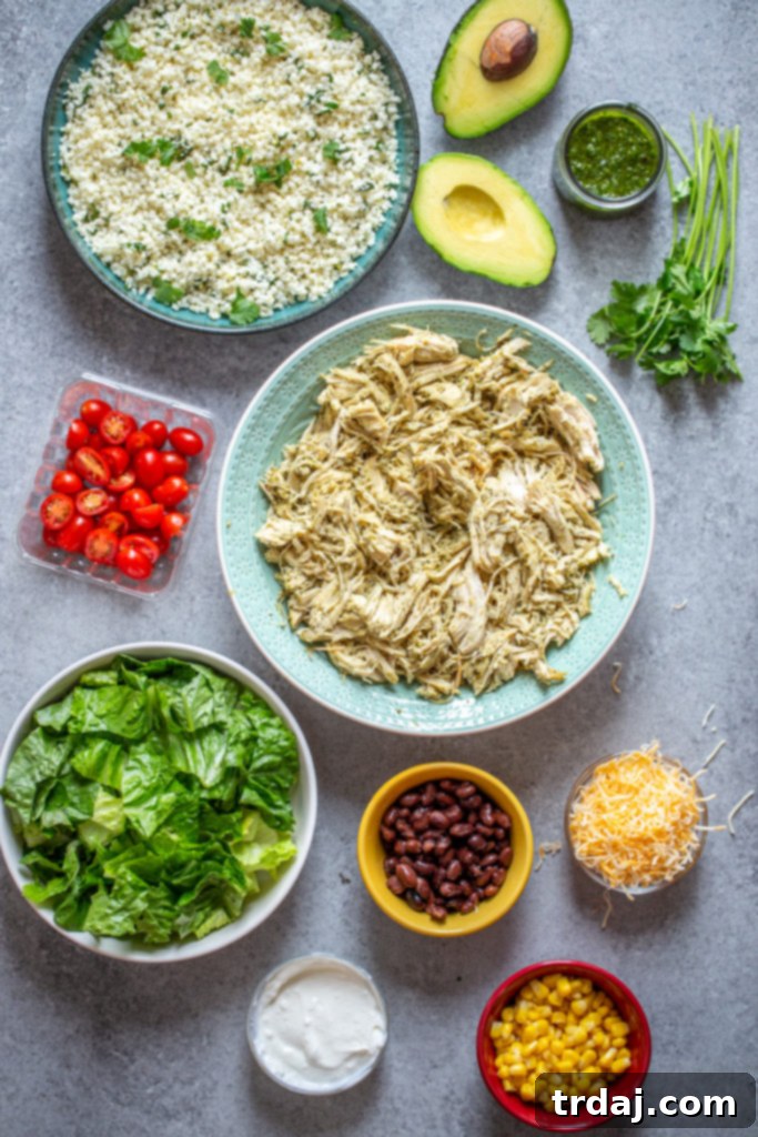 Assembled Instant Pot Salsa Verde Chicken Burrito Bowl with various toppings.