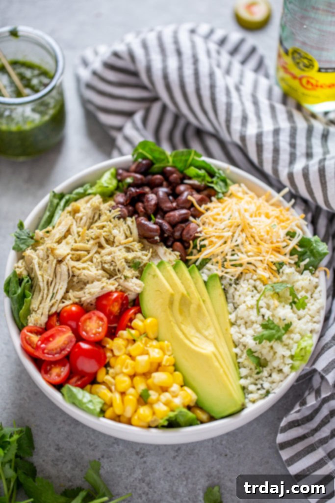 A beautifully arranged Instant Pot Salsa Verde Chicken Burrito Bowl.