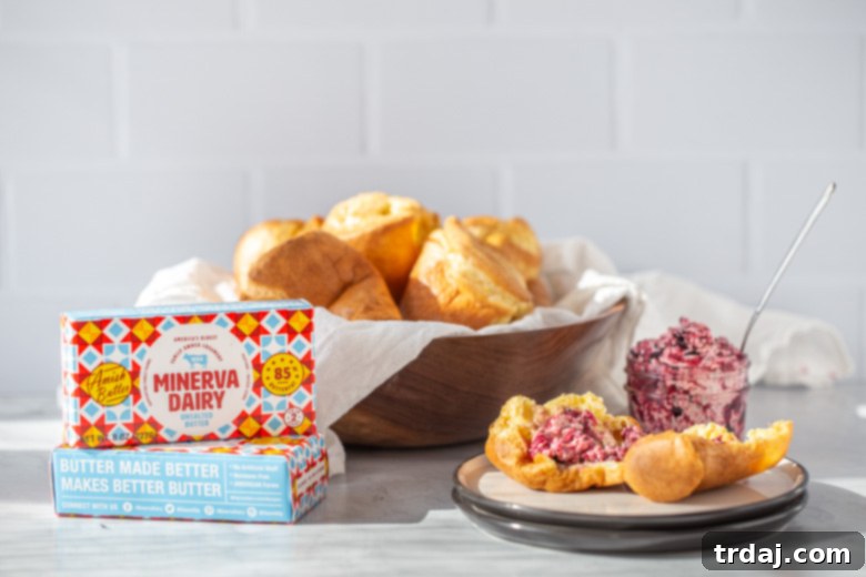 Several finished popovers made with Minerva Dairy butter, showcased on a plate