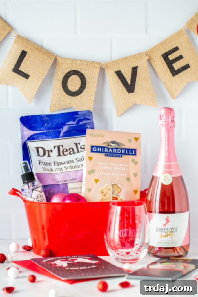 A beautifully arranged Valentine's Day gift basket for her, featuring luxurious bath salts, fragrant bath bombs, gourmet chocolates, and a celebratory bottle of wine.