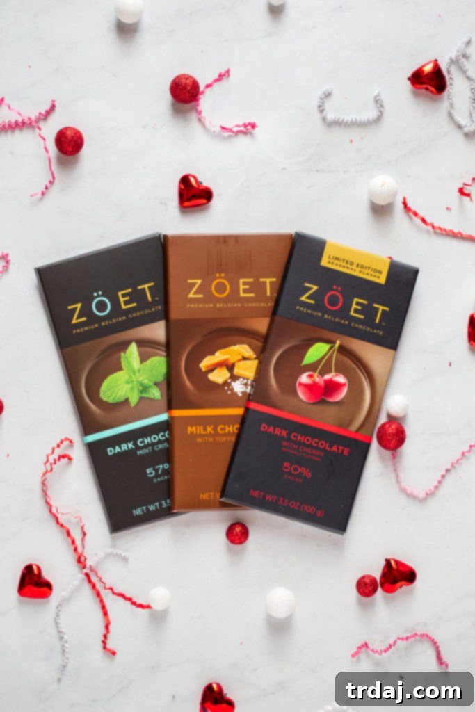 A vibrant display of Zoet gourmet chocolate bars in a variety of delicious flavors, readily available at Hy-Vee.