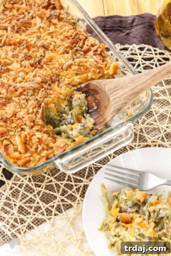The Best Homemade Green Bean Casserole with Fresh Mushrooms, Cheddar, and Crispy Onions - A perfect Thanksgiving side dish.