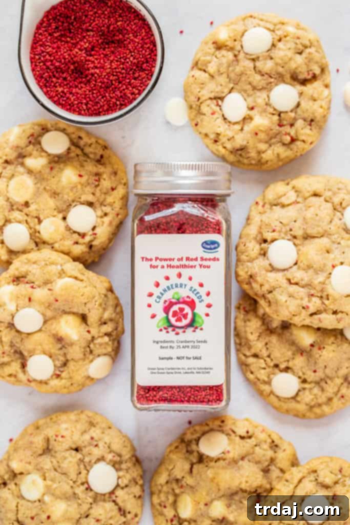 These White Chocolate Cranberry Oatmeal Cookies are soft, chewy and with added health benefits of cranberry seeds making them the BEST recipe! Ocean Spray Cranberry Seeds surrounded by White Chocolate Cranberry Oatmeal Cookies