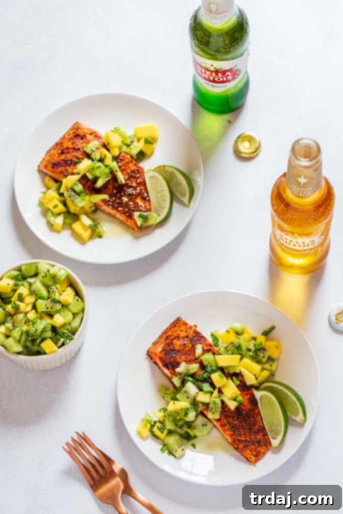 Plated Jerk Salmon with Kiwi Mango Salsa and sides