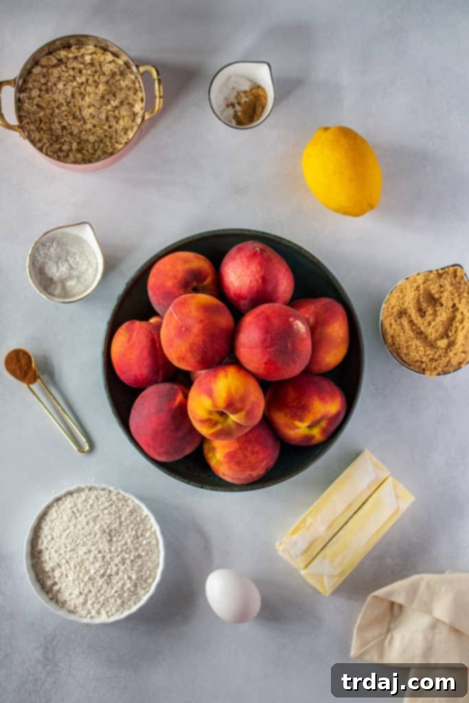 Various ingredients for peach cobbler crumble bars laid out on a surface, including peaches, flour, butter, and spices.