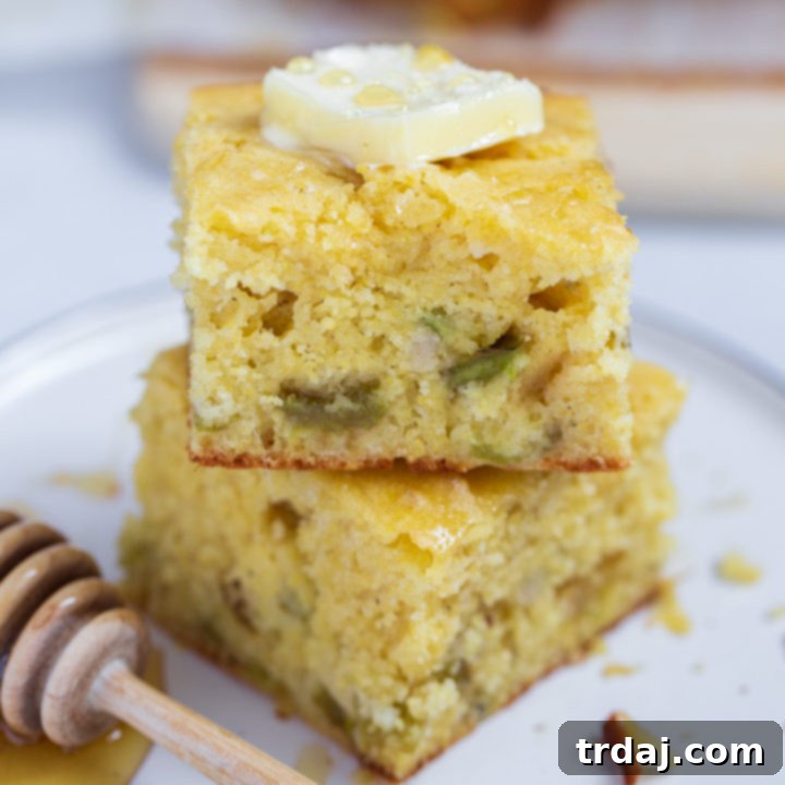 Southwestern Green Chile Cornbread 6 Beautifully cut pieces of Roasted Green Chile Cornbread, showcasing its golden crust and moist interior.