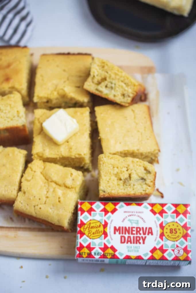 Buttery Roasted Green Chile Cornbread with Minerva Dairy Butter Freshly baked roasted green chile cornbread, sliced and served with a pat of Minerva Dairy butter melting on top.