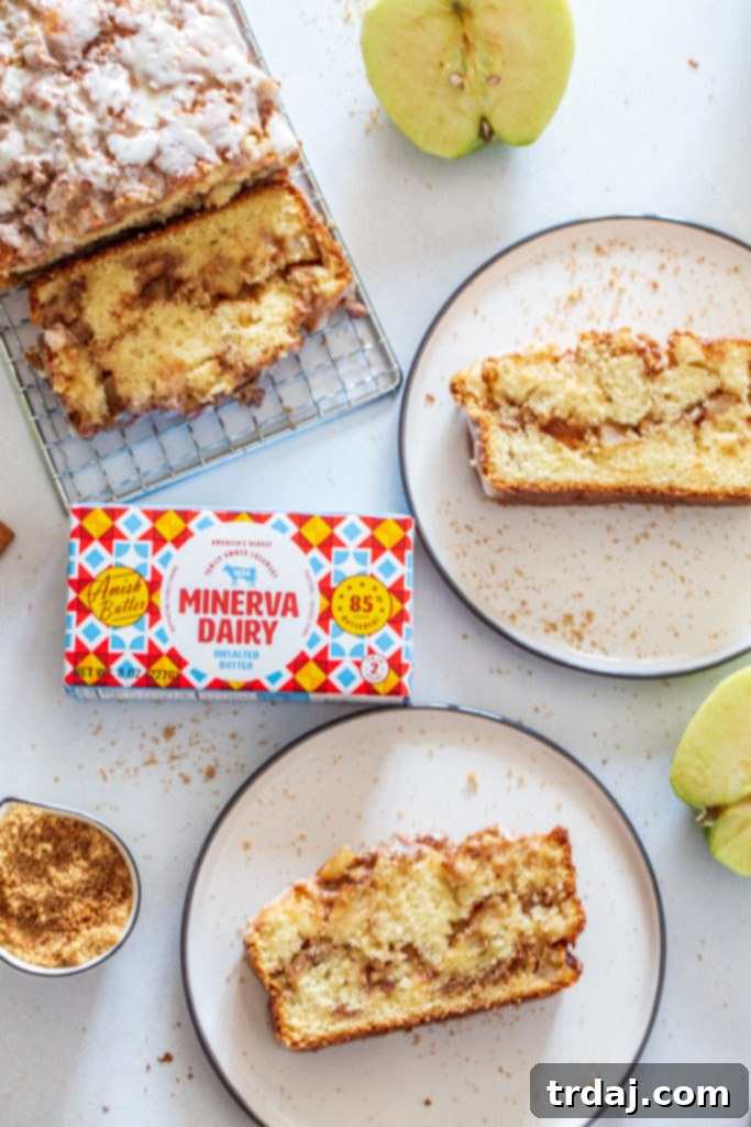 Overhead photography shot of apple fritter bread with two slices and full loaf, beautifully glazed