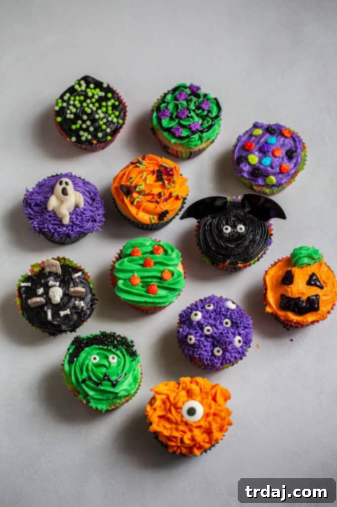 A Halloween Cupcake Treat Board in an elevated display, showing various decorated cupcakes.