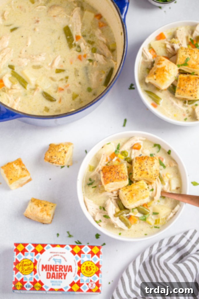 Minerva Dairy butter on a cutting board next to soup ingredients