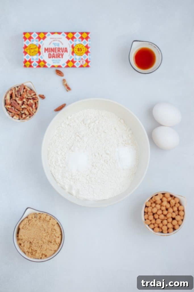 Ingredients for Turtle Biscotti laid out on a baking surface.