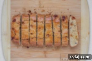 Baked biscotti logs cooling.