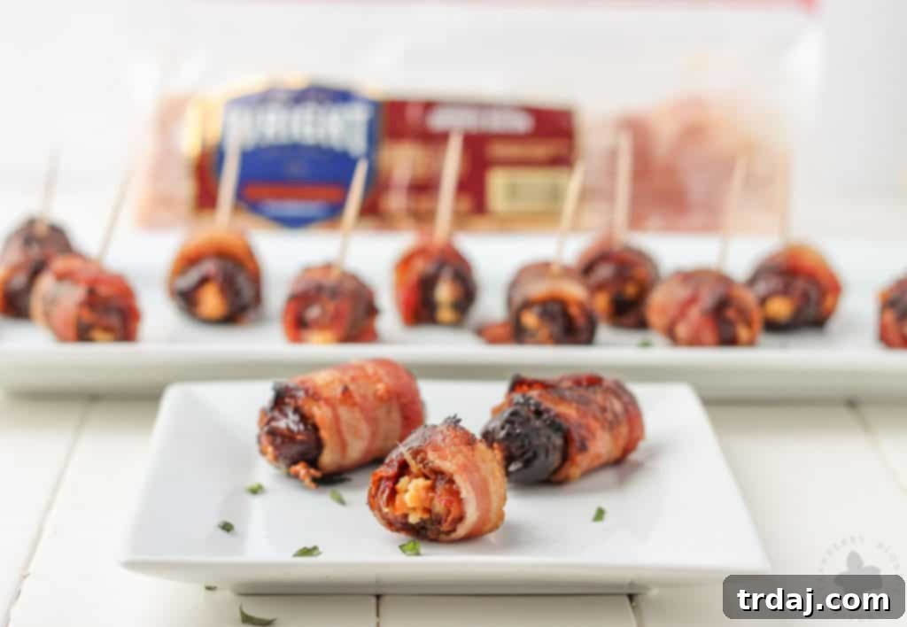 Sweet, creamy, sharp and smoky, these Bacon Wrapped Blue Cheese Stuffed Dates are perfect for your next party! 3 ingredients and super simple, these are sure to be your next go to appetizer for all those upcoming holiday festivities. | Strawberry Blondie Kitchen