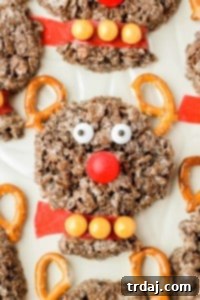 Delicious Rudolph the Red-Nosed Reindeer Cocoa Pebbles Treats will joy and delight kids and adults alike. Easy holiday recipe!