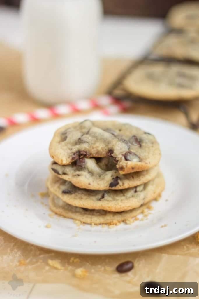 Soft, chewy, a little crunchy on the outside, buttery and sweet, these Espresso Chocolate Chip Cookies combine two of the best flavor combos, coffee and chocolate. They are a perfect pair, match made in Heaven, two peas in a pod...you get my drift. | Strawberry Blondie Kitchen