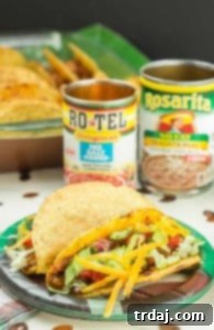 Easy and delicious Healthier Oven Baked Tacos are super simple to make, feed a crowd and use ingredients that you can already find in your pantry. Perfect for watching the BIG GAME and feeding the hungry football fans! | Strawberry Blondie Kitchen