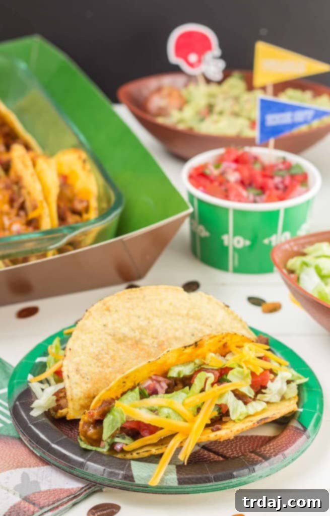 Close-up of a perfectly topped healthier oven baked taco, ready to eat.