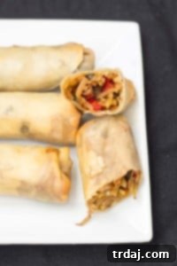 Baked Vegetable Egg Rolls are delicious, packed with vegetable goodness and aren't fried like traditional egg rolls. Easy, fun to eat and a perfect side dish to any meal! | Strawberry Blondie Kitchen