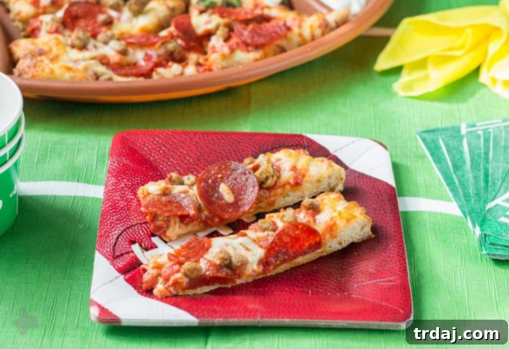 DiGiorno pizza, sliced into dippable strips, served alongside homemade dipping sauces for an easy and delicious game day party. Perfect for home tailgating. | Strawberry Blondie Kitchen