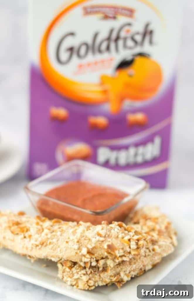 Crispy Pretzel Chicken Tenders with Sweet & Tangy Blackberry Honey Mustard 11 Kids starving after school and you’re tired of feeding them the same ole snack? Try these Pretzel Crusted Chicken Tenders. Chicken Tender strips are coated in Goldfish® Pretzel Crackers, baked in the oven and served with a delicious Blackberry honey mustard sauce dipping sauce your kids will love! | Strawberry Blondie Kitchen