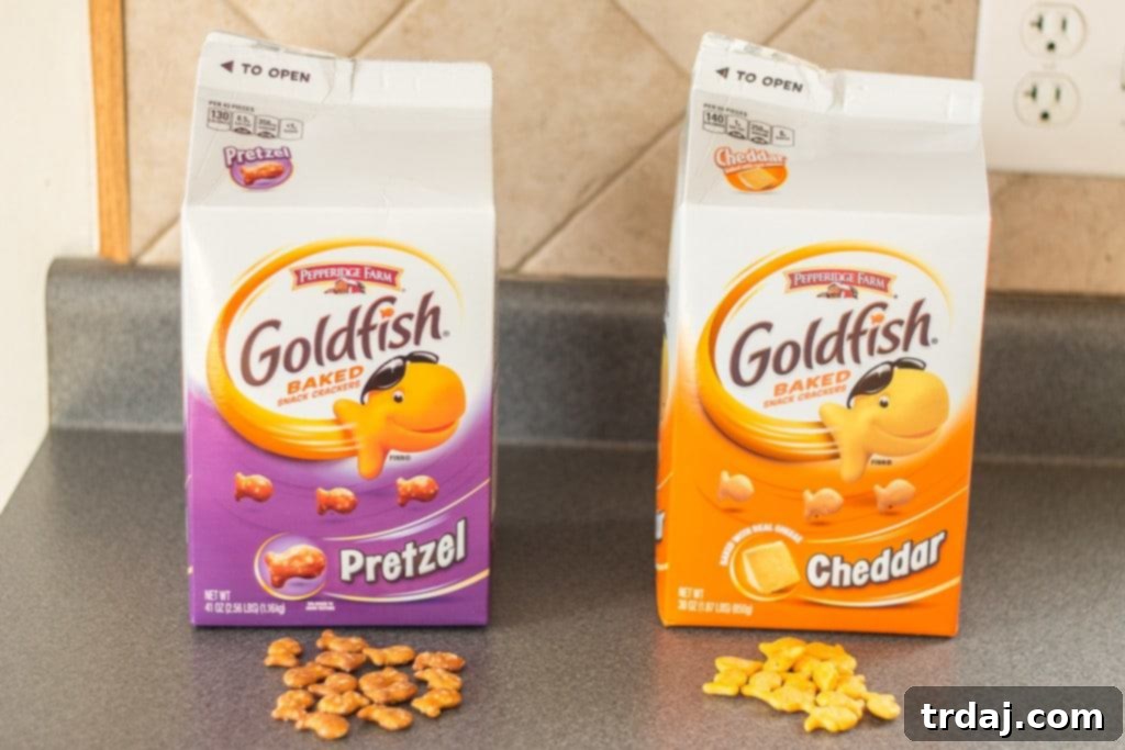 Crispy Pretzel Chicken Tenders with Sweet & Tangy Blackberry Honey Mustard 5 Kids starving after school and you’re tired of feeding them the same ole snack? Try these Pretzel Crusted Chicken Tenders. Chicken Tender strips are coated in Goldfish® Pretzel crackers, baked in the oven and served with a delicious Blackberry honey mustard sauce dipping sauce your kids will love! | Strawberry Blondie Kitchen