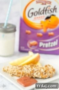 Crispy Pretzel Chicken Tenders with Sweet & Tangy Blackberry Honey Mustard 10 Crispy Pretzel Crusted Chicken Tenders with a vibrant Blackberry Honey Mustard Dipping Sauce, perfect for hungry kids after school or a family-friendly dinner. Made with Goldfish® Pretzel Crackers for an irresistible crunch.