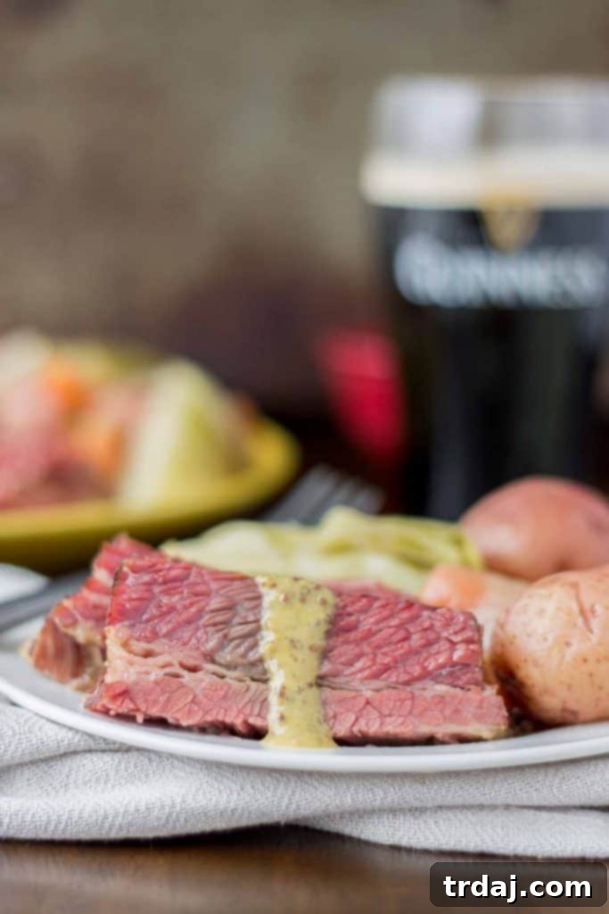 Experience the ultimate easy St. Patrick's Day meal with our Slow Cooker Corned Beef with Cabbage and Potatoes – moist, tender, and packed with traditional Irish flavor. Slow Cooker Corned Beef with Cabbage and Potatoes