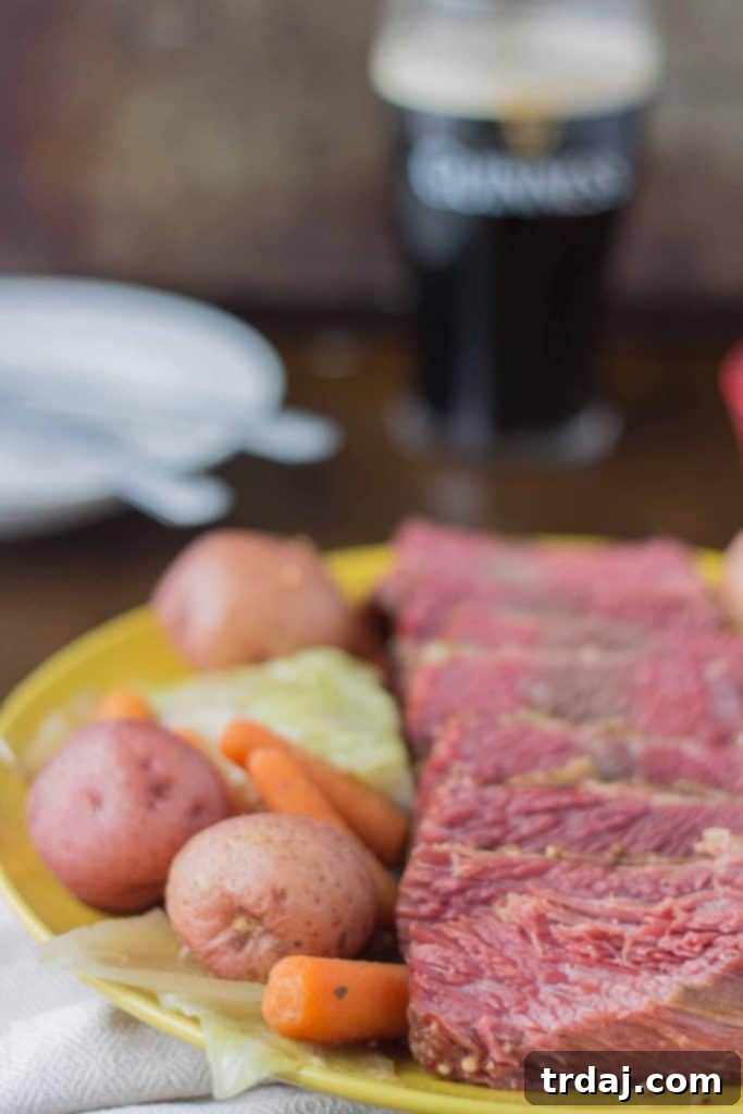 Prepare to impress with this easy Slow Cooker Corned Beef with Cabbage and Potatoes recipe, perfect for family dinners and St. Patrick's Day celebrations. Slow Cooker Corned Beef with Cabbage and Potatoes