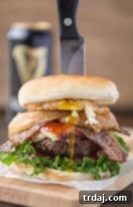 Irish Cream & Stout Burger 7 An All American beef patty with Guinness Battered Onion rings, Jameson BBQ sauce and Candied Baileys Bacon, this Irish Car Bomb Burger is literally a flavor bomb! | Strawberry Blondie Kitchen