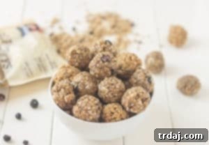 These 4 ingredient, no bake, Blueberry Muffin Energy Bites are the perfect grab and go breakfast or snack. Packed with good for you super grains and seeds, these will be your new and nutritious way to start your day or tackle your afternoon to do list! | Strawberry Blondie Kitchen