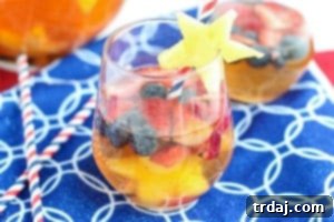 Freedom Fluffs 5 Refreshing Red White and Blue Sangria, an ideal drink for summer gatherings.