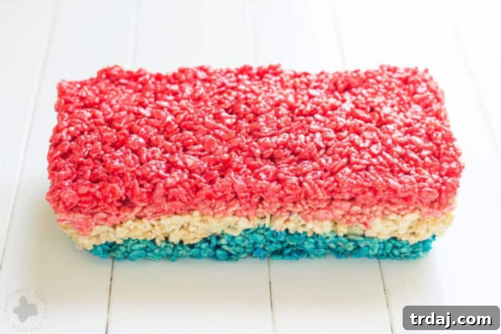Freedom Fluffs 7 Overhead view of perfectly layered Patriotic Crispy Treats, showcasing the vibrant red, white, and blue colors.