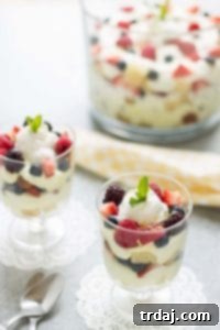 Sunshine Berry Delight 7 Celebrate the bountiful berries of the season with this Lemon Berry Trifle. Strawberries, blueberries, raspberries and blackberries are layered between tart lemon pudding, whipped cream and studded with delicious pound cake. The perfect summer dessert for all your backyard parties! | Strawberry Blondie Kitchen