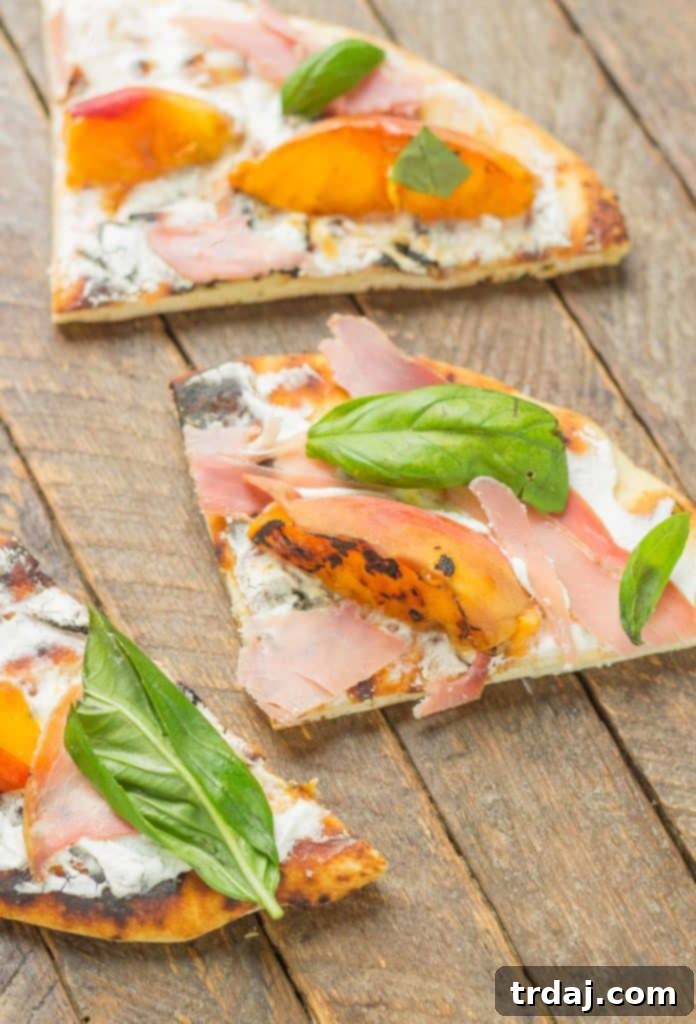 Close-up of the Grilled Peach, Prosciutto, and Goat Cheese Pizza, highlighting the juicy peach slices, rich prosciutto, and creamy goat cheese texture | Strawberry Blondie Kitchen