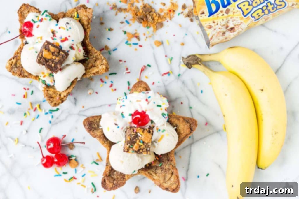 Two golden cookie bowls filled with ice cream and colorful toppings, viewed from above