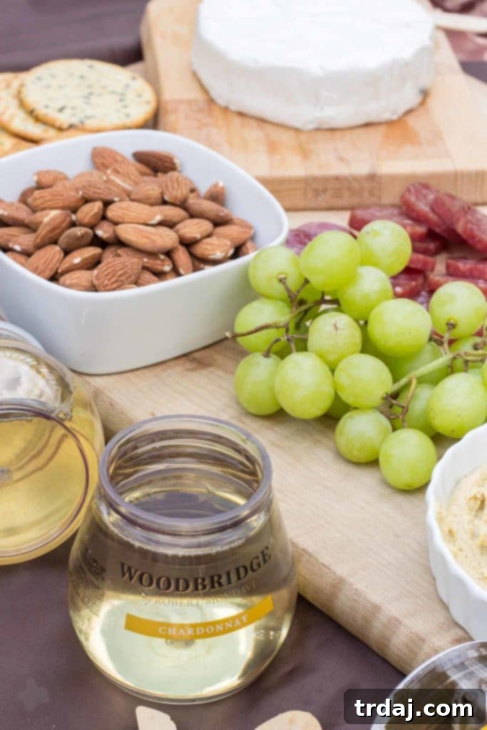 Essentials for a perfect picnic: blanket, food, drinks, and good company.