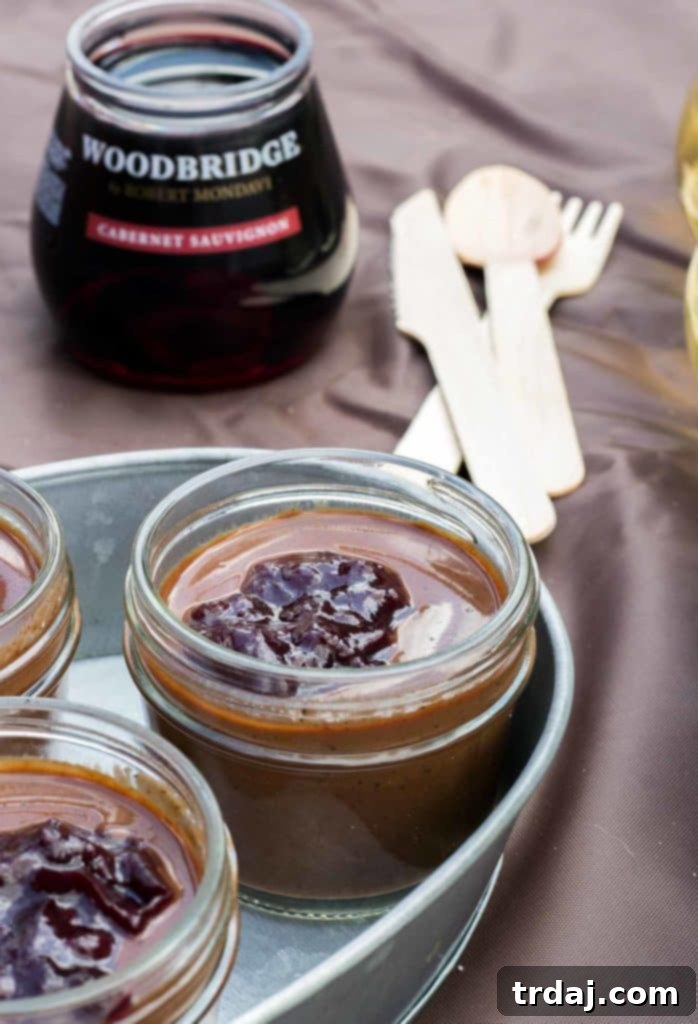Mini Chocolate Mason Jars with Cherry Jam, a perfect portable dessert for a romantic picnic.
