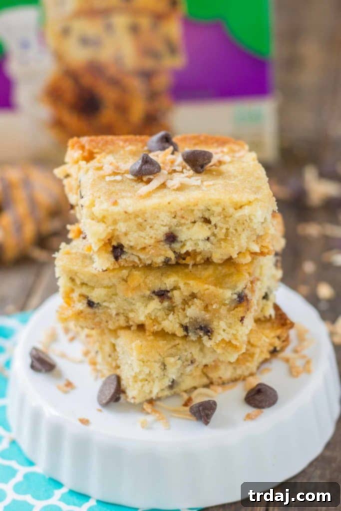 These Pillsbury Pillsbury Girl Scouts Baking Mixes feature the flavor of Samoas in their Caramel and Coconut Blondies and Thin Mint Cookies in their Thin Mint Brownies. All I can say is, Pillsbury nailed it. Now you can enjoy the flavor of Girl Scout cookies all year long! | Strawberry Blondie Kitchen