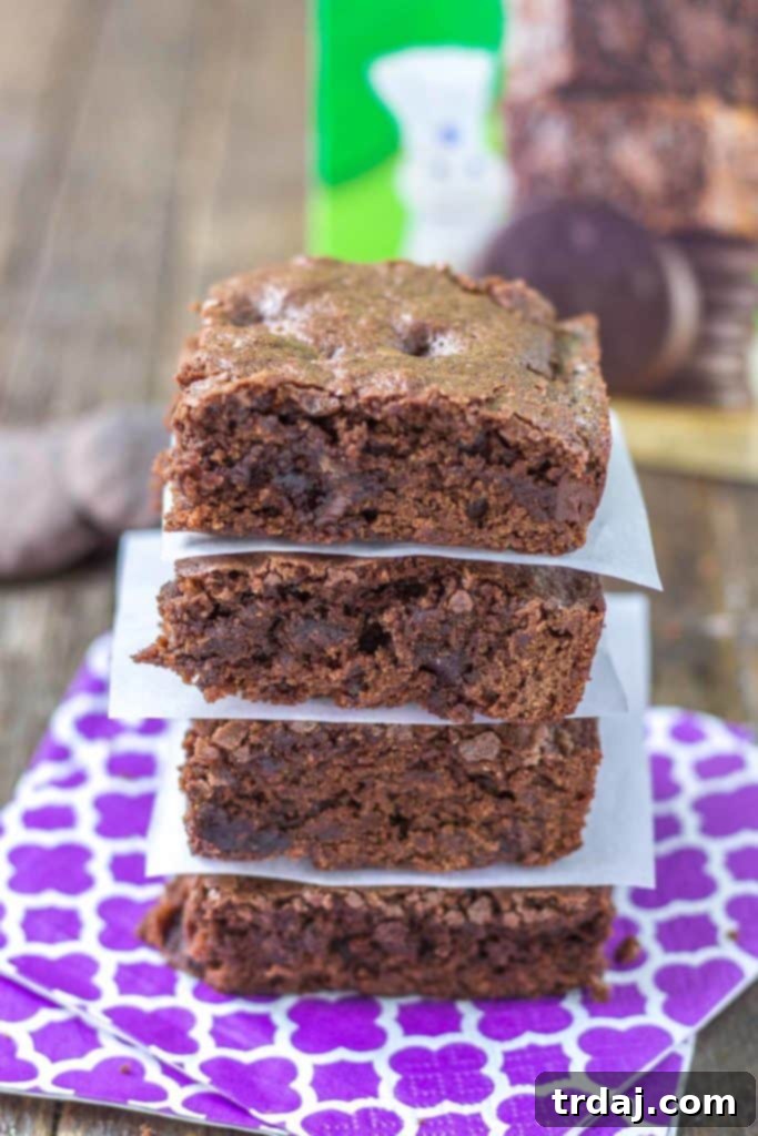 These Pillsbury Pillsbury Girl Scouts Baking Mixes feature the flavor of Samoas in their Caramel and Coconut Blondies and Thin Mint Cookies in their Thin Mint Brownies. All I can say is, Pillsbury nailed it. Now you can enjoy the flavor of Girl Scout cookies all year long! | Strawberry Blondie Kitchen